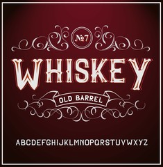 Vintage label font. Whiskey label style with vintage ornament