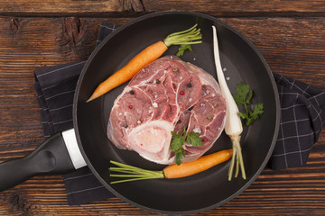 Raw ossobuco ingredients.