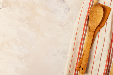 Kitchen background with towel and cooking tools.