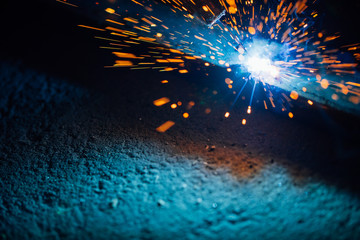 artistic welding sparks light, industrial background