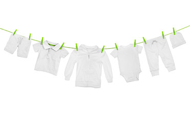 Laundry line with light clothes, isolated on white background