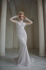 Obraz premium portrait of beautiful blonde bride with fashion hairstyle and make-up