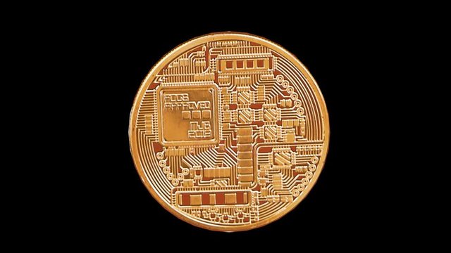 Cripto currency Bitcoin coin spin on black background loop
