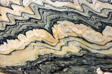 Background of black marble with interspersed
