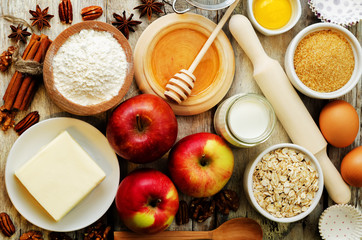 baking ingredients: apples, nuts, honey, flour and butter