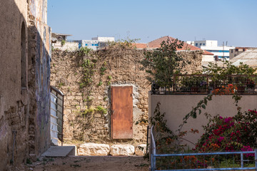 Door in a brick wall in an old city district