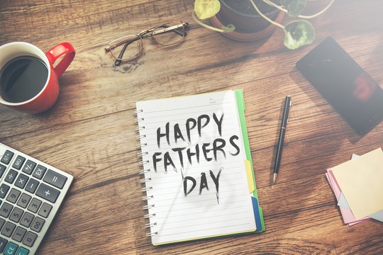 happy fathers day text on notepad