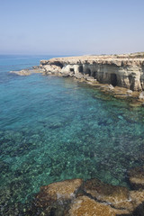 Sea caves of Cavo greco cape. Cyprus. Mediterranean sea