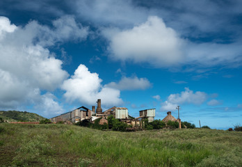 Fototapeta na wymiar Abandoned buildings at old sugar mill at Koloa Kauai