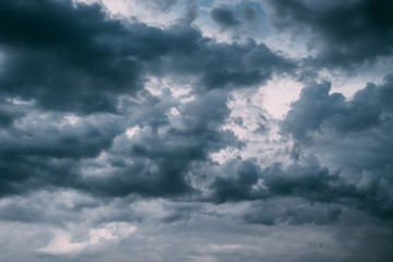 Fototapeta premium Dramatic black clouds and thunderstorm before rainy
