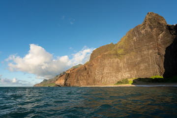 Fototapeta na wymiar Na Pali coastline taken from sunset cruise along Kauai shore