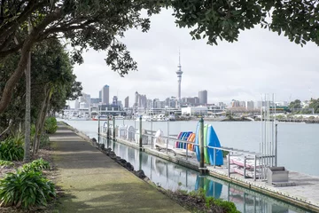 Abwaschbare Fototapete Neuseeland Dinghies and boats at Westhaven Marina with Auckland CBD skyline - New Zealand, NZ