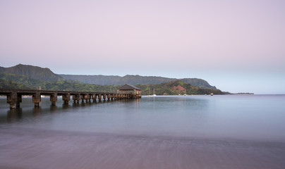 Fototapeta na wymiar Dawn and sunrise at Hanalei Bay and Pier on Kauai Hawaii