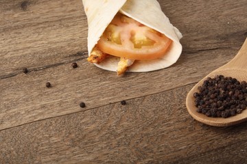 Doner kebab - fried chicken meat with vegetables