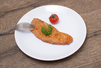 Beef steak on a wooden board