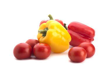 Red peppers and tomatoes on a white background