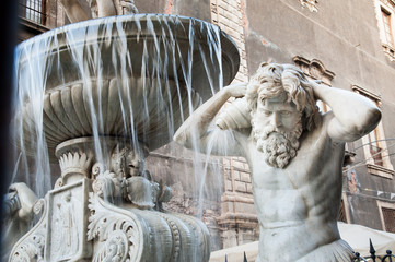 Landmarks of Catania, Sicily: closeup view of the Amenano fountain by the main Dome Square