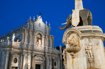 Fototapeta premium Landmarks of Catania, Sicily; night view of the famous lava stone statue of an elephant and its obelisk in the main Square 
