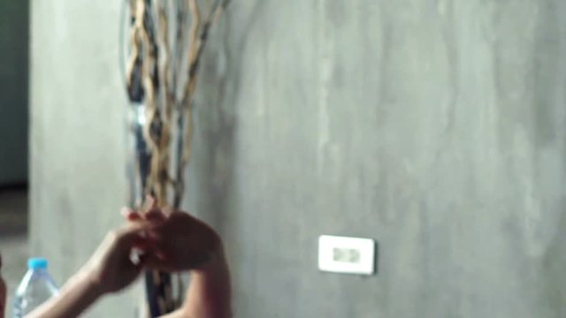 Young woman exercising, doing crunches on mat at home, super slow motion
