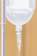 Patient Saline on brown background in hospital.