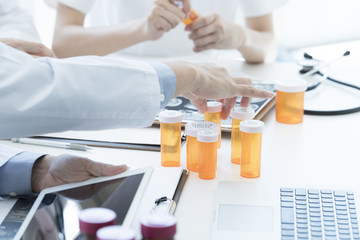 Doctor has plastic container