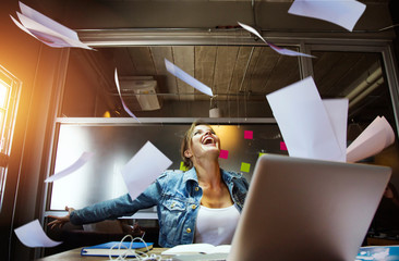 Business woman enjoy her work.