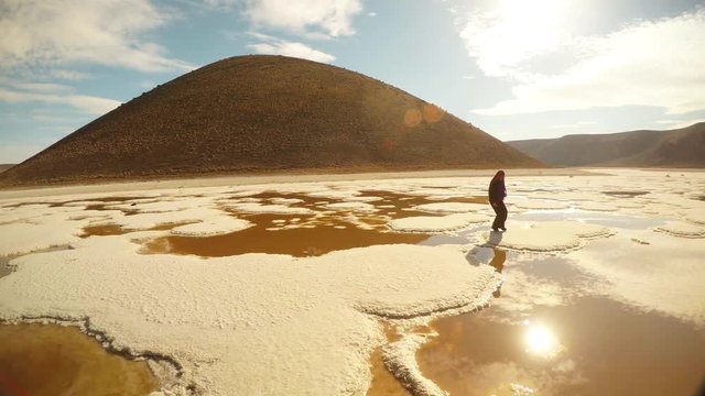 Girl Runs and Jumps on Salt Islets Meke Lake Karapinar