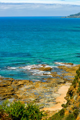All shades of blue of the Pacific ocean.