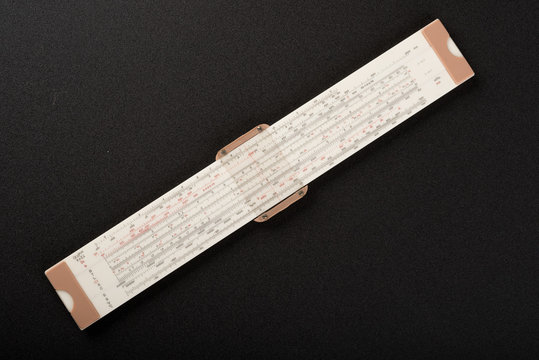 professional vanitation pipe ruler on top of black sand paper