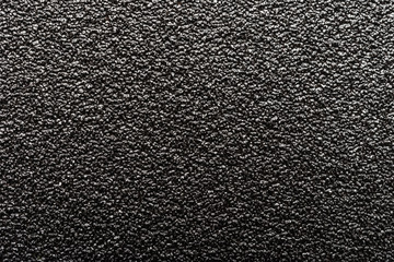 background of rough black sand paper