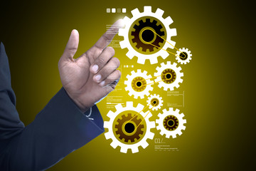 Business man with gear technology