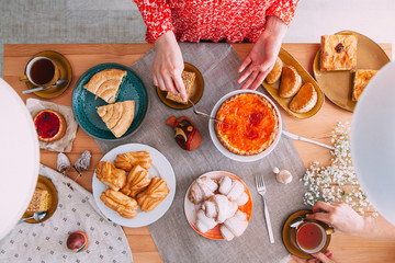 Pastries and desserts in the composition in rag background