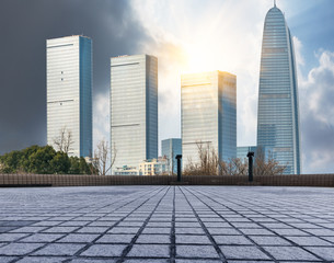 Fototapeta premium empty brick platform with Shanghai skyline in background.