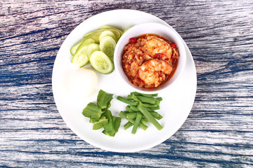 Fresh shrimp chili dip served with side dish.