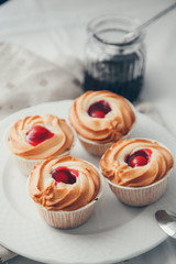 Pastries and desserts in the composition in rag background