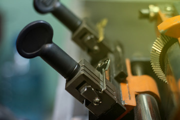 Machine production of duplicate metal key.