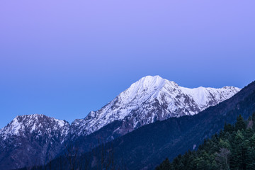Fototapeta na wymiar Mountain landscape with purple sky