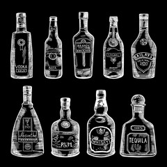 Fototapeta na wymiar Hand drawn illustration of different bottles isolate on dark background. Vector pictures set