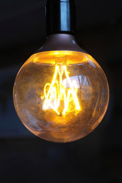 Glowing vintage light bulb