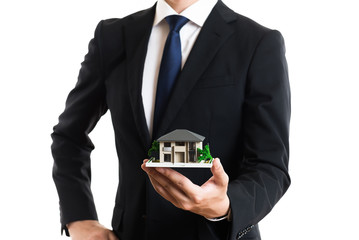 ビジネスマンと家イメージ