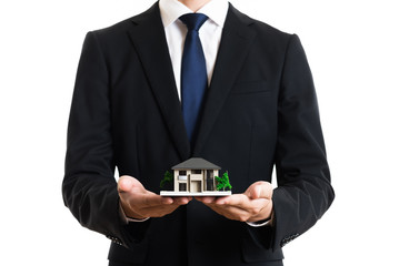 ビジネスマンと家イメージ
