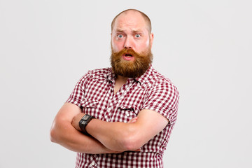 Surprised man with beard , mustache