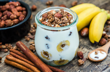 Serving of Yogurt with  Muesli, Banana and Nuts