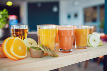 Fresh fruit juice, healthy drinks on wooden table.