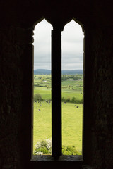 view of the Irish countryside through a castle window