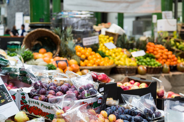 Obraz premium Fresh Plums at Market