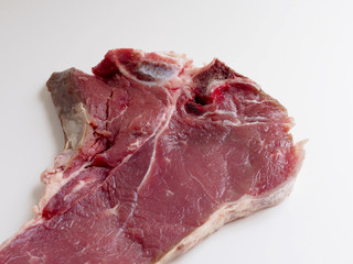 Veal chop on white background