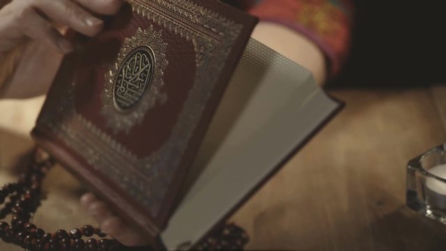 Muslim women reading Holy Koran