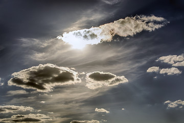Obraz premium the light of the sun through the clouds