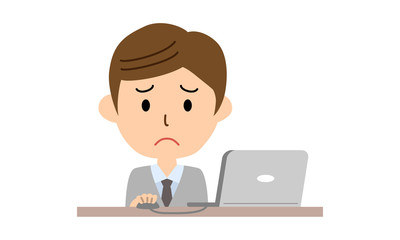 ノートパソコンを操作する男性